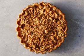 apple crumble pie on gray countertop