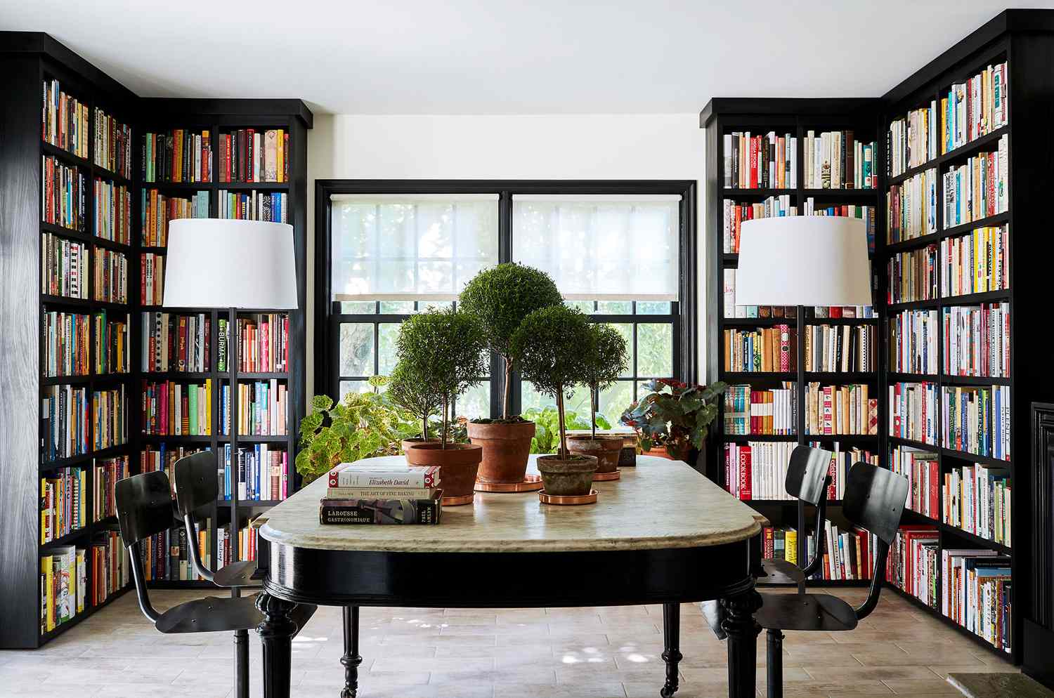 Dining room library black shelves cookbooks