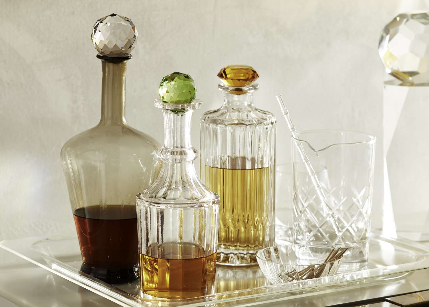 Colorful decanters on a bar