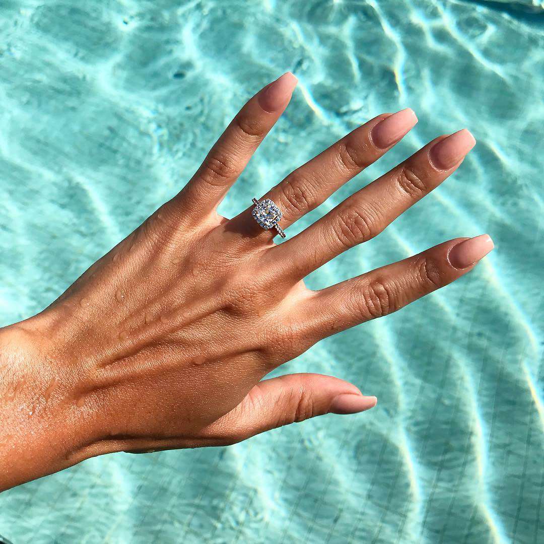 engagement ring selfie swimming pool