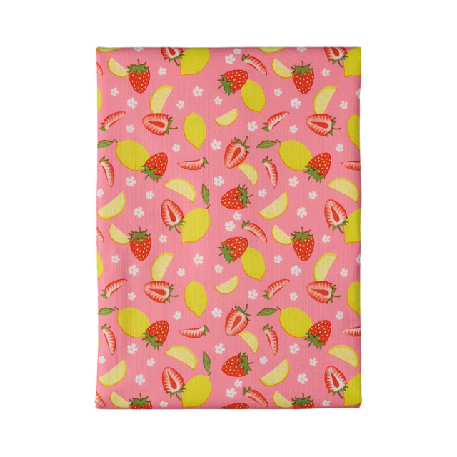 A patterned design featuring lemons and strawberries on a pink background