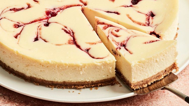 round cranberry cheesecake with slice cut