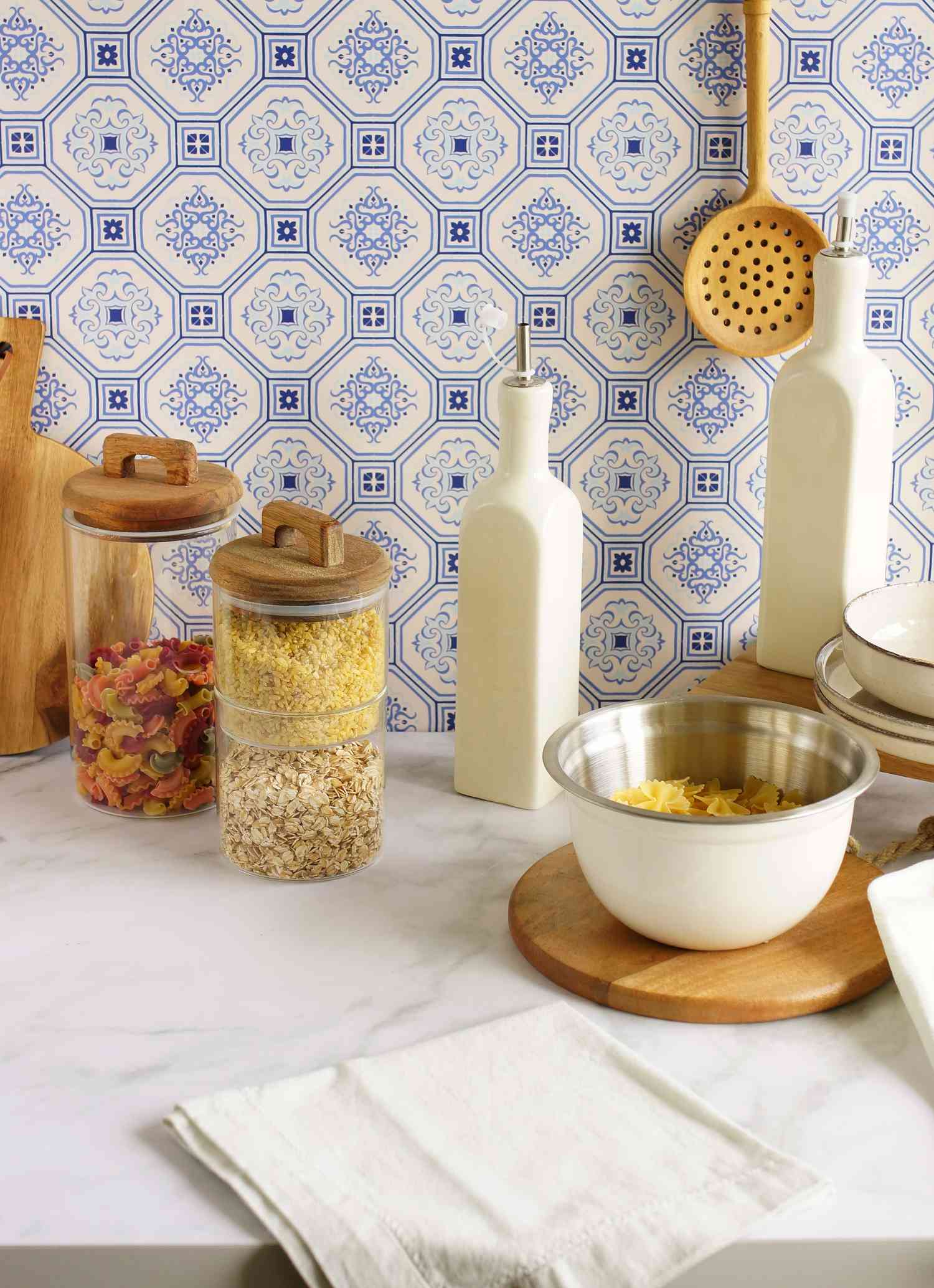 Kitchen with blue and white tile backsplash