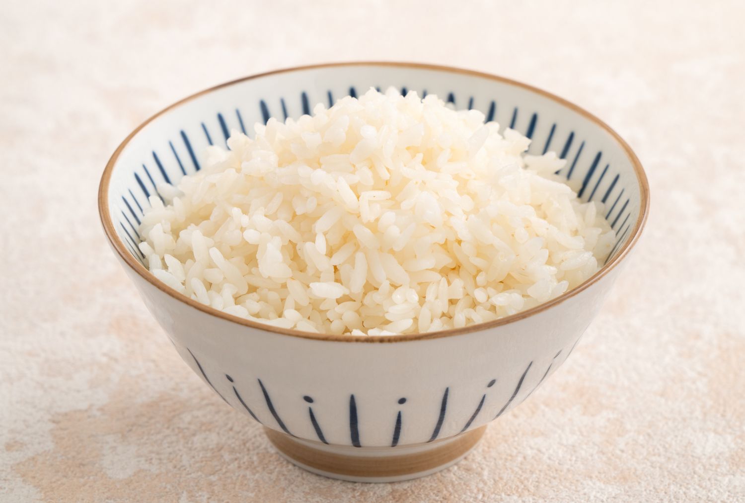 A bowl of rice in a decorative bowl