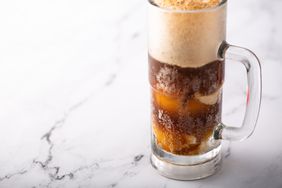 Root beer or soda ice cream float in a large mug
