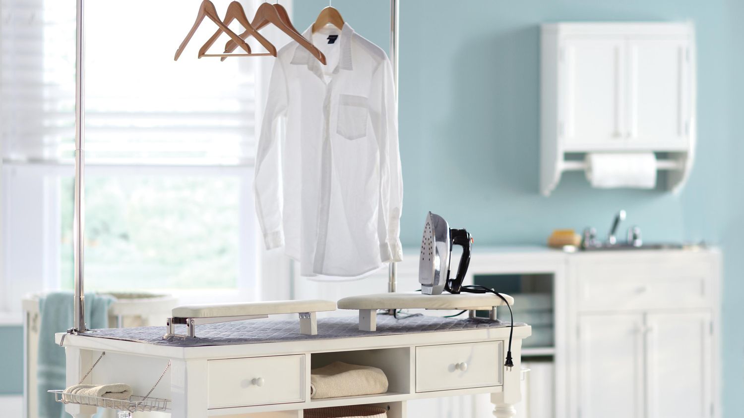 laundry room with iron