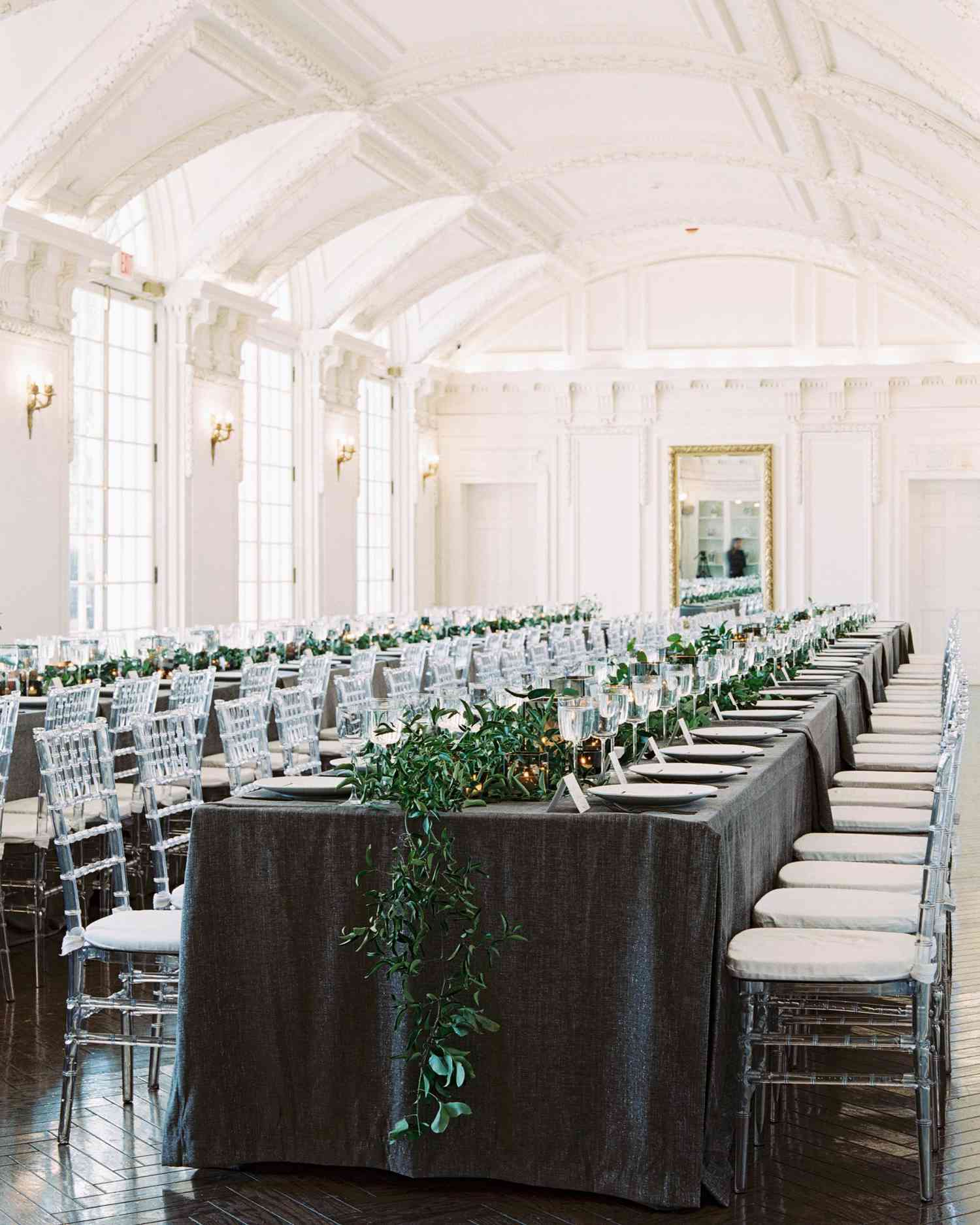 Long Reception Table with Red Flower Arrangements