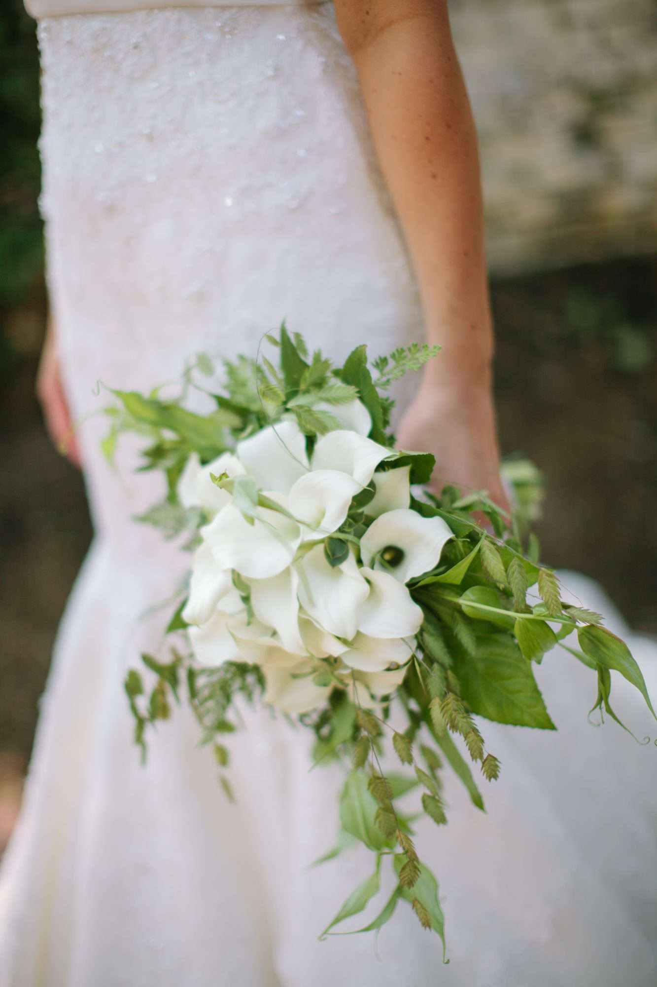 bouquet with white calla lilies and greenery
