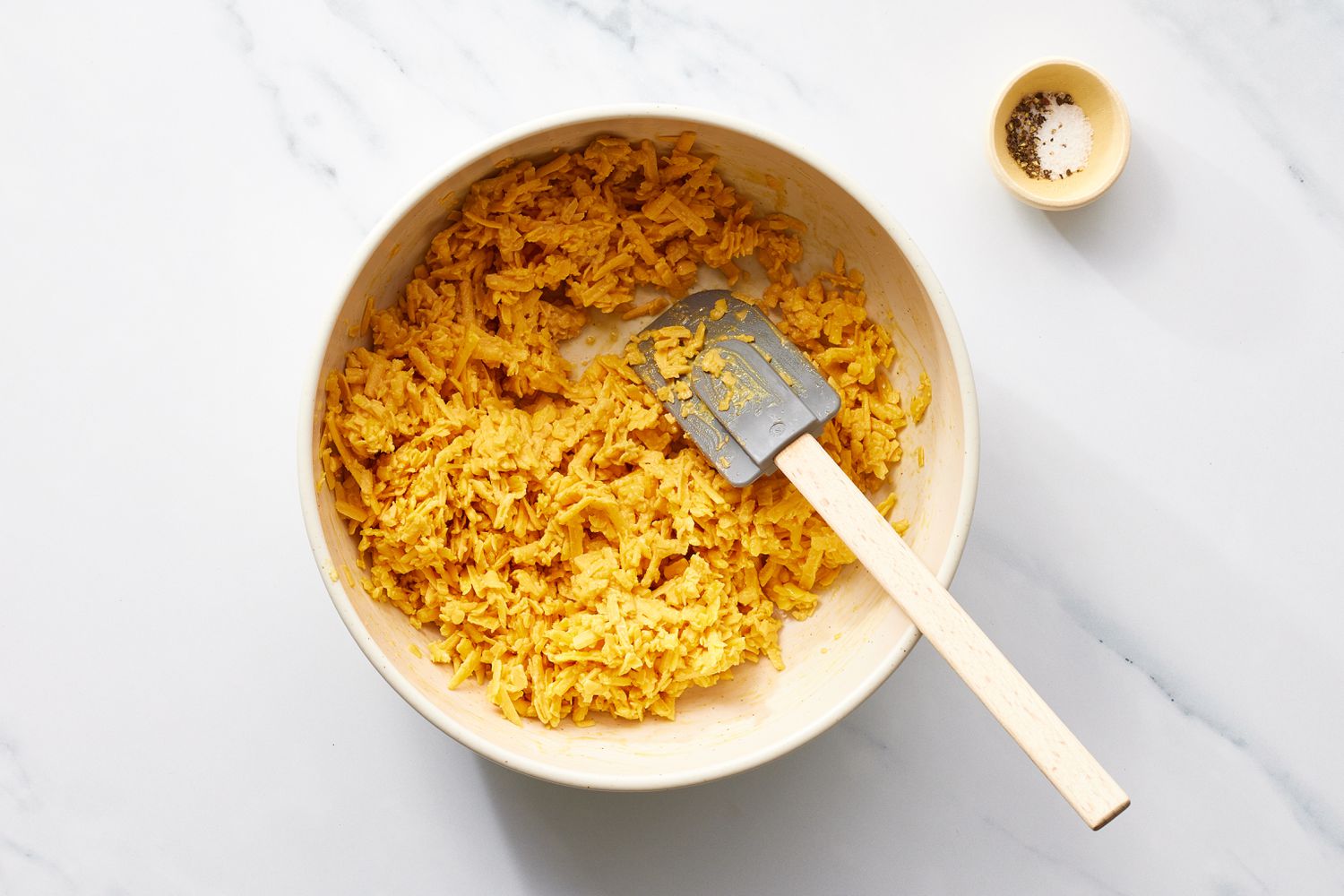 Combined ingredients for welsh rarebit in a bowl
