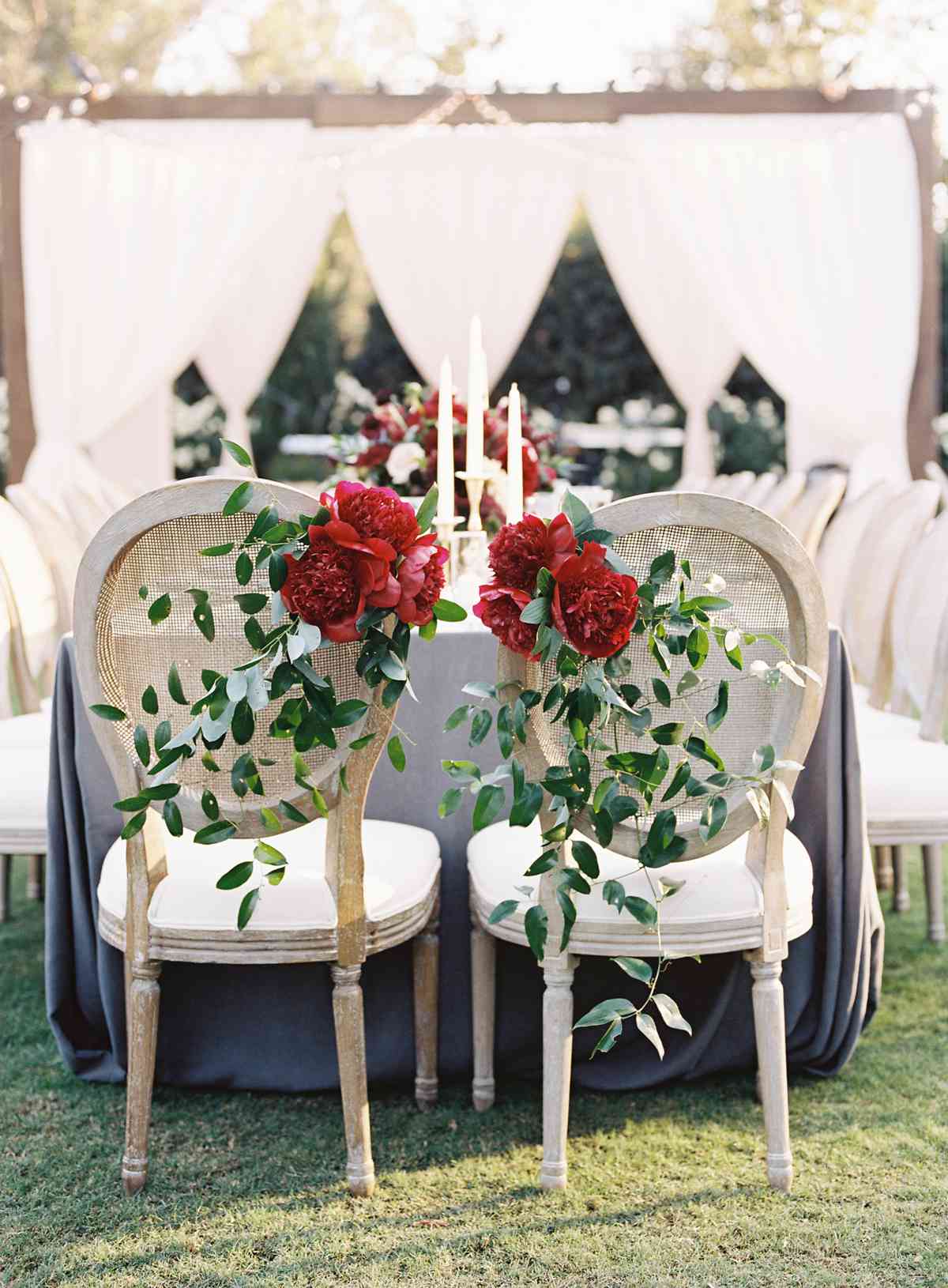 crimson peonies on the back of chairs