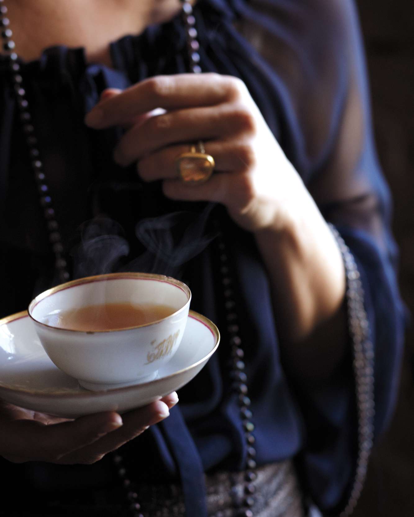 holding bellocq tea cup