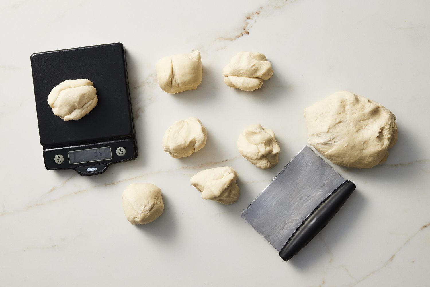 Pieces of dough with scale