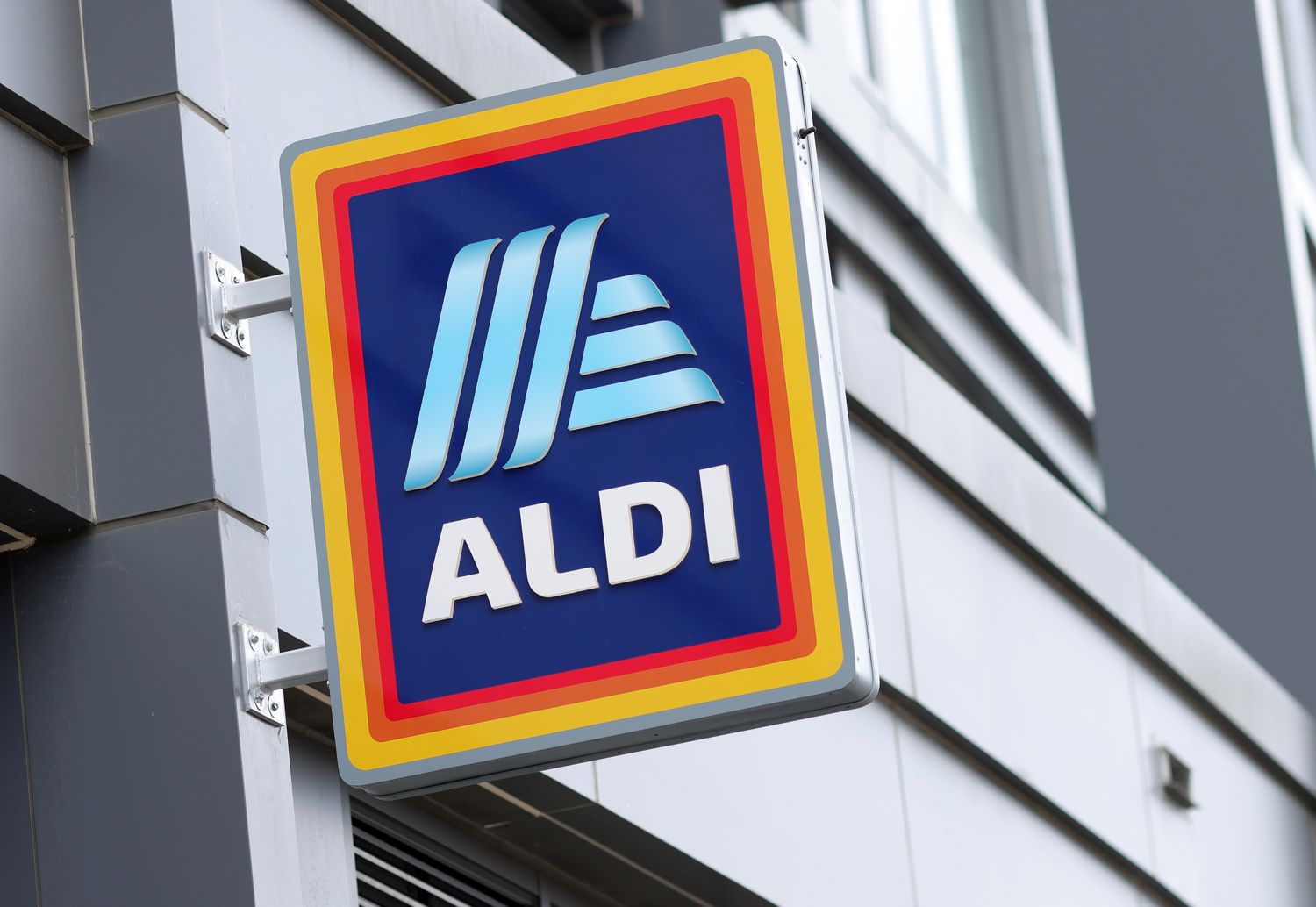 Exterior sign for an Aldi store attached to a building