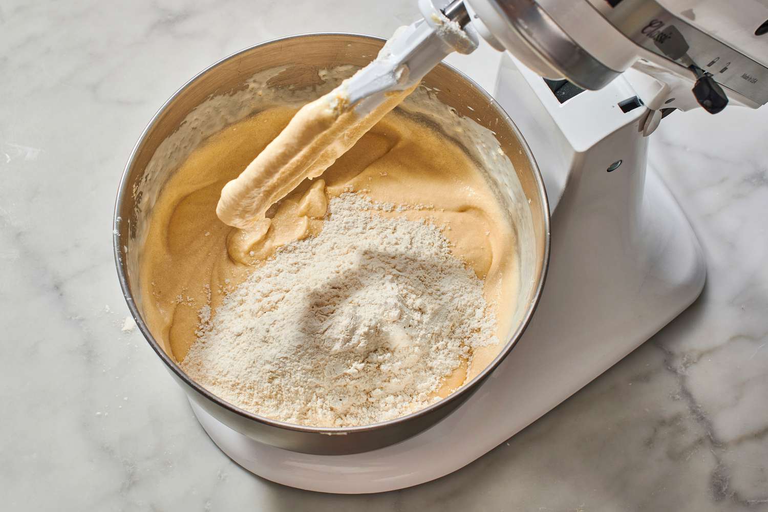 flour added to yellow cake batter in mixer