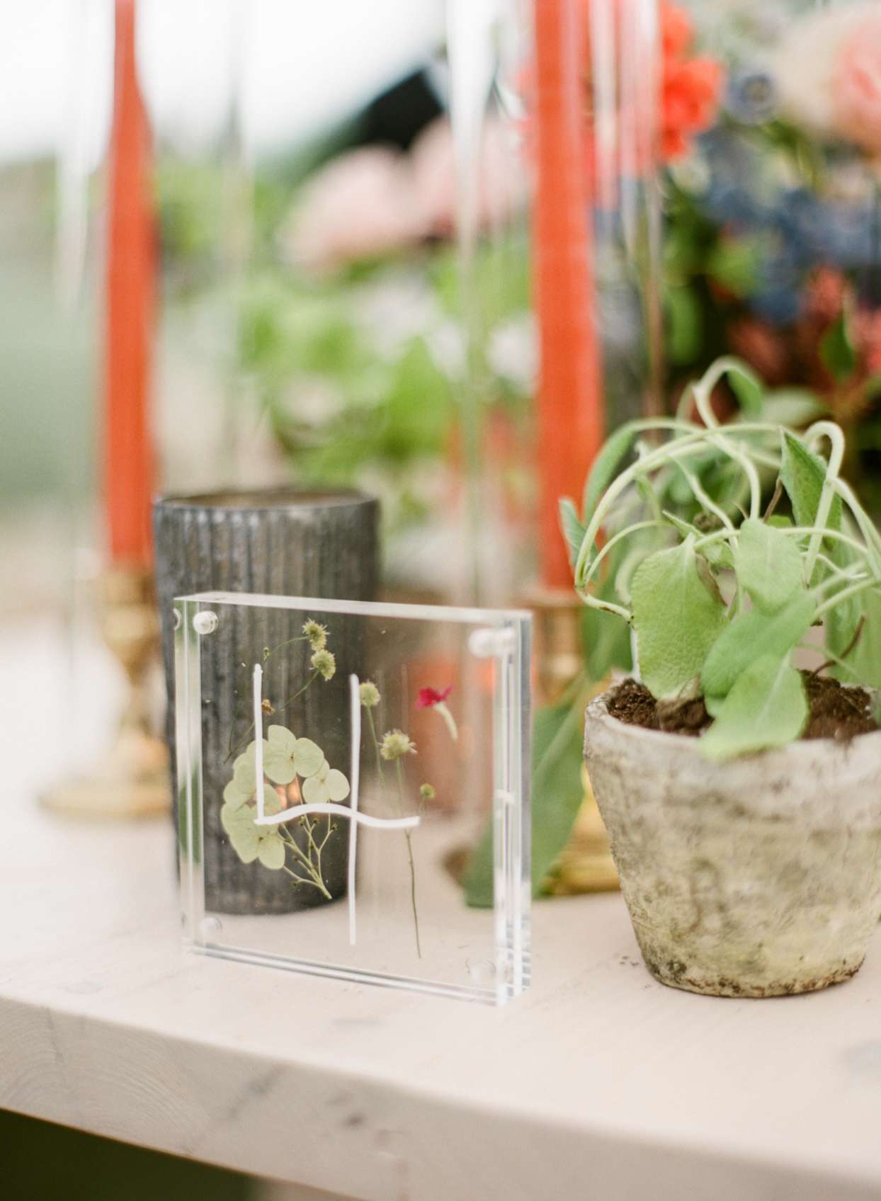 clear table number with pressed flowers