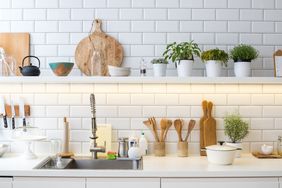 open shelving in white kitchen