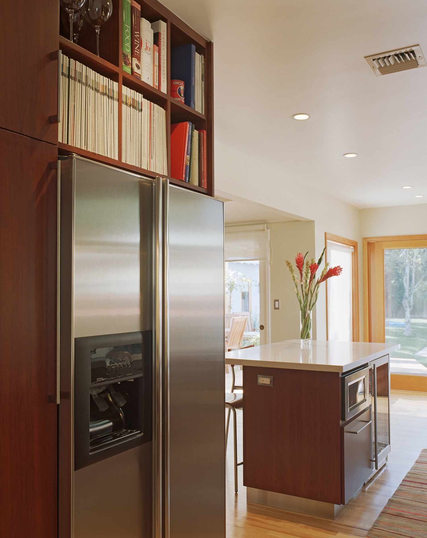 Cookbook library over fridge