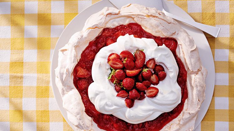 strawberry-lemonade angel pie topped with fresh strawberries