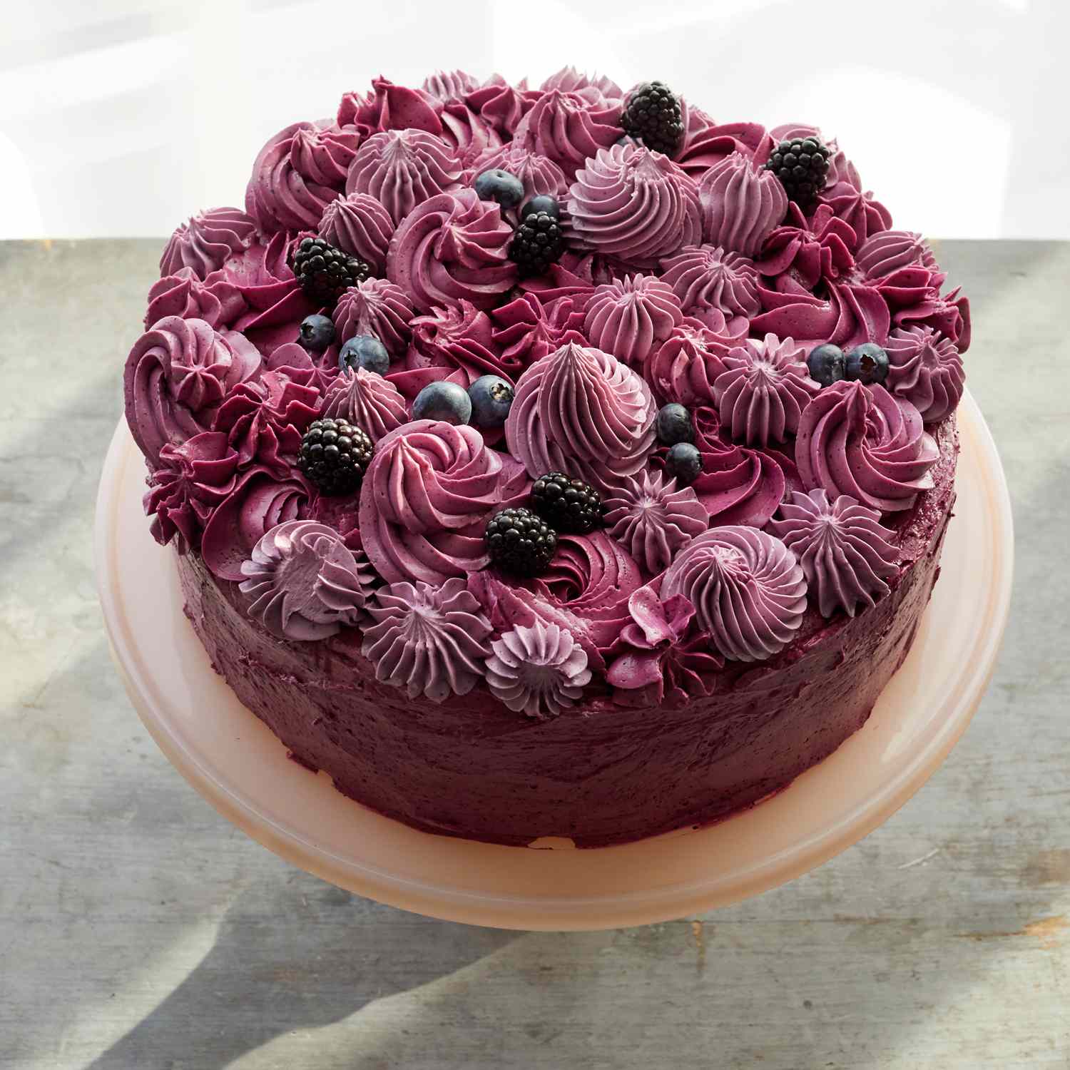 purple frosted berry layer cake