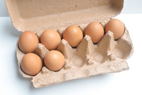 brown eggs in carboard egg carton