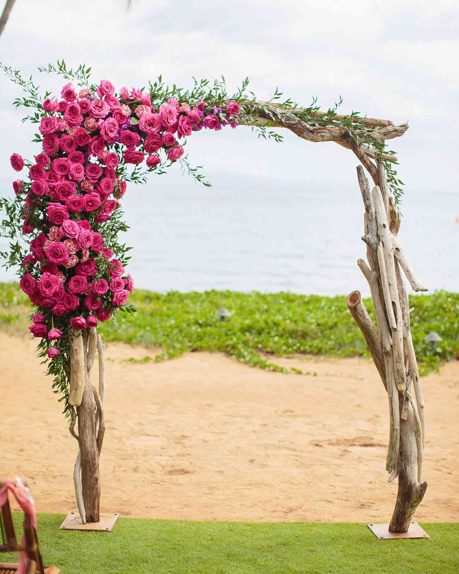 Unkempt Willow Branch Wedding Arch with Pink and Orange Flowers