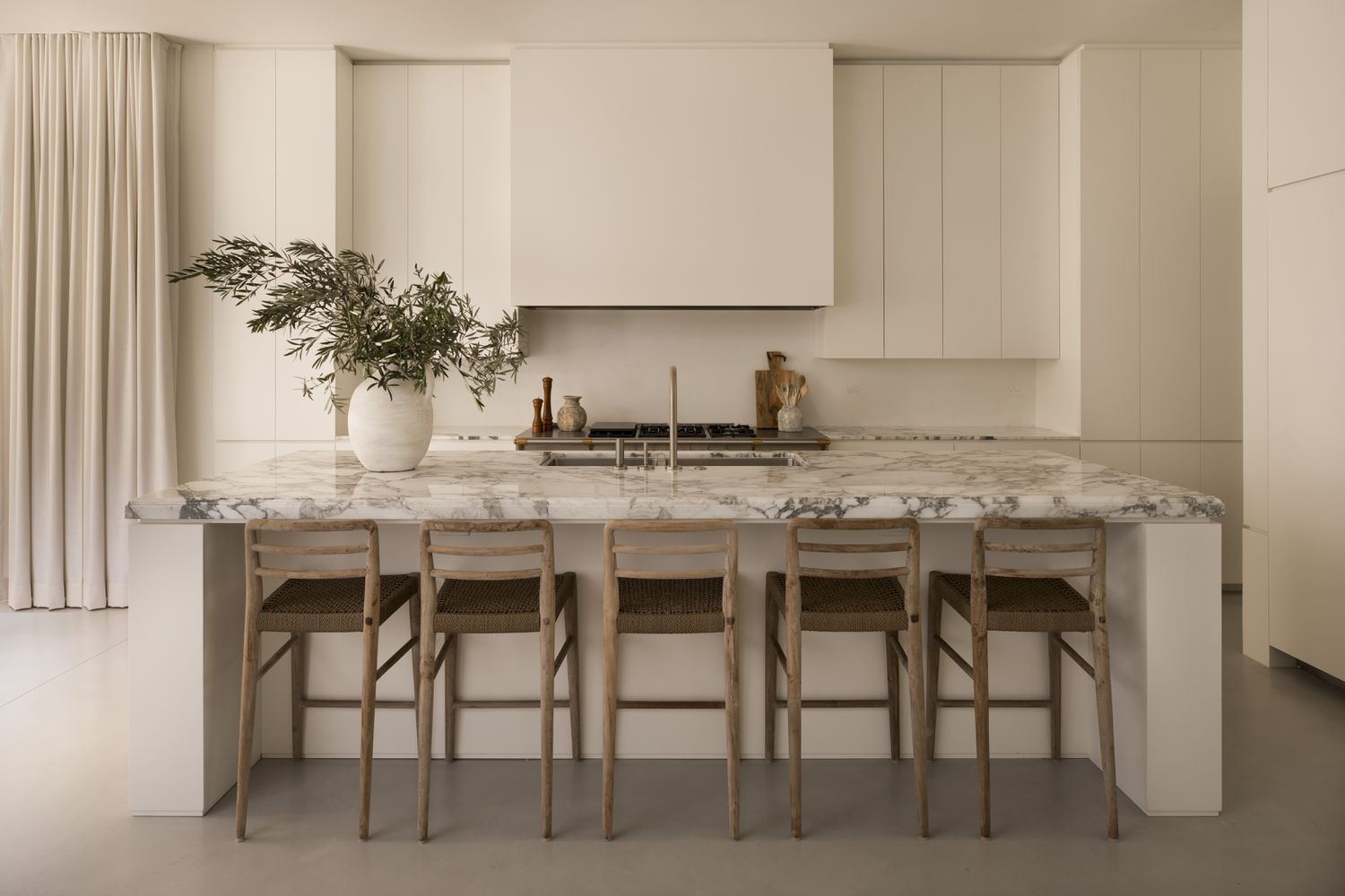 white kitchen with stone countertop