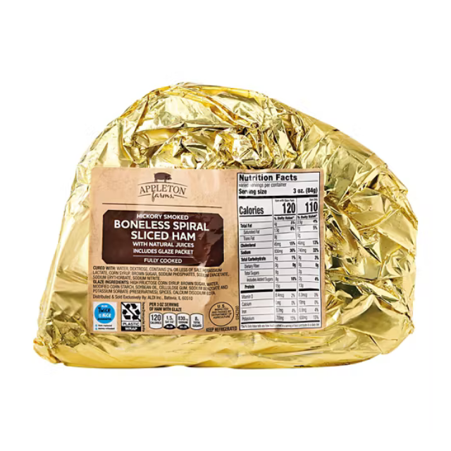 Boneless spiral sliced ham in gold foil packaging with visible label and nutrition facts