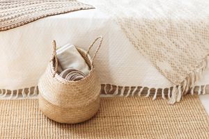 white room with throw blankets