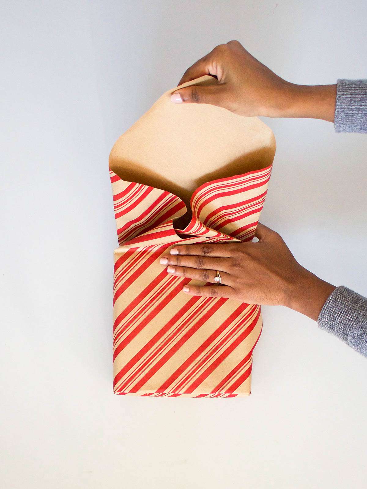Person wrapping gift