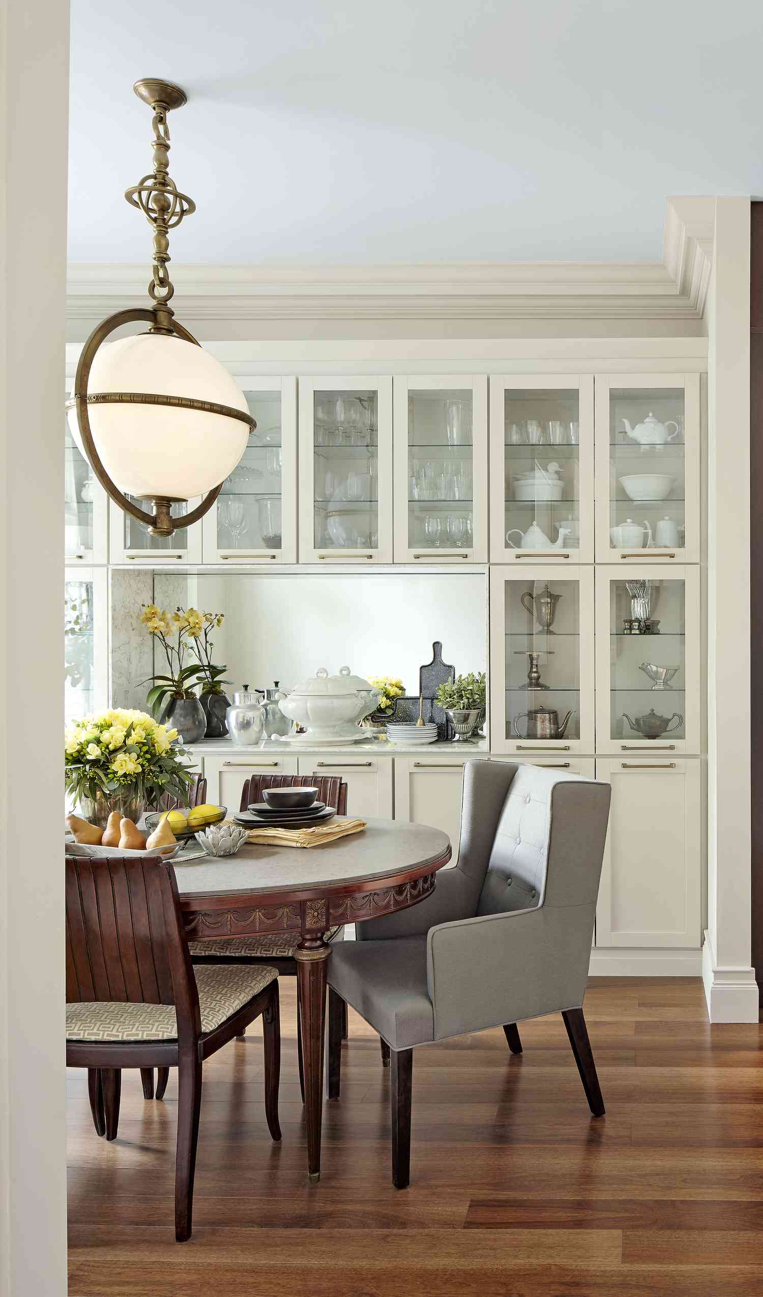 Dining room with built in shelving displaying China