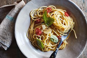 spaghetti with garlic oil and chile served on gray plate