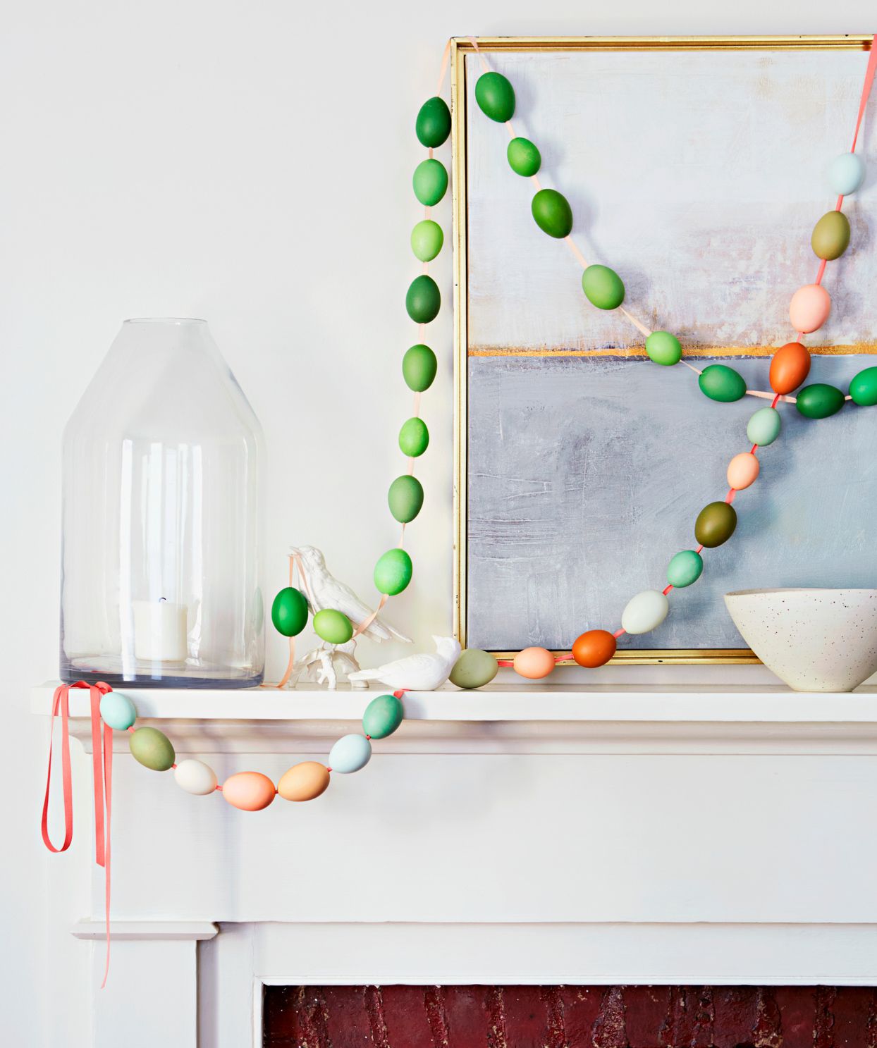 egg garland over fireplace