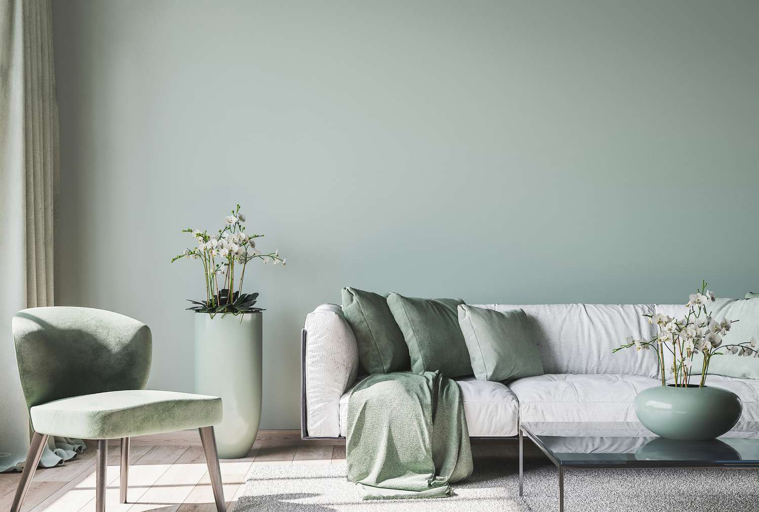 Warm minimalist living room in sage green