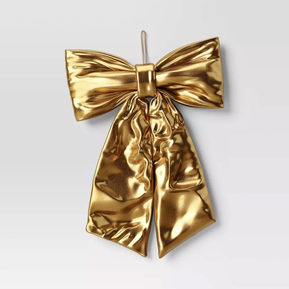 Oversized Christmas tree gold bow