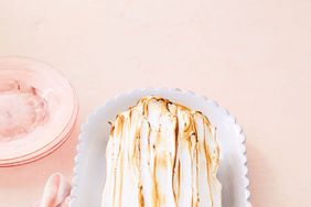 coffee caramel swiss roll on white plate
