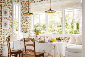 room with orange pattern wallpaper