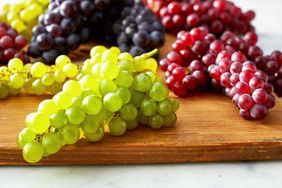 Grapes on a cutting board
