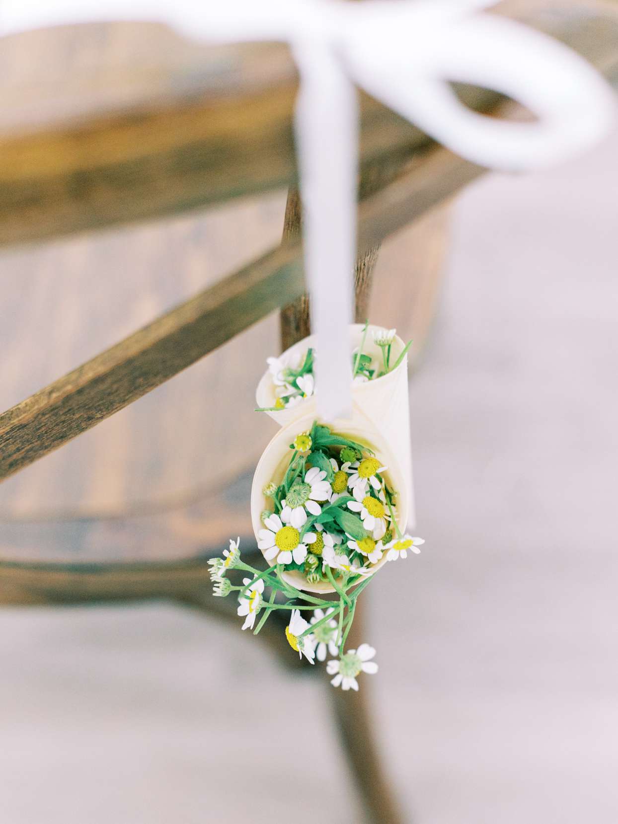 white cones of flower petals for ceremony toss