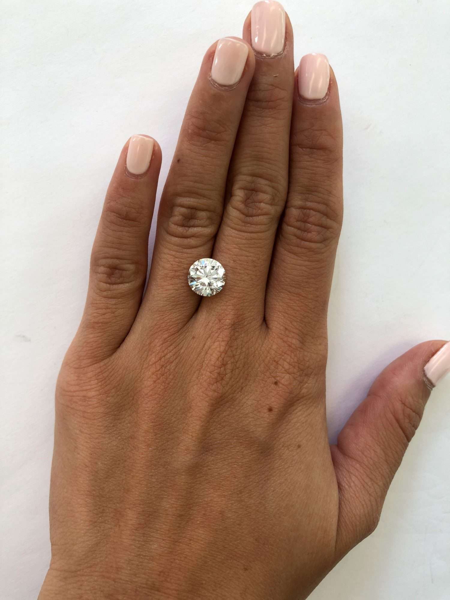 hand with 3 carat diamond