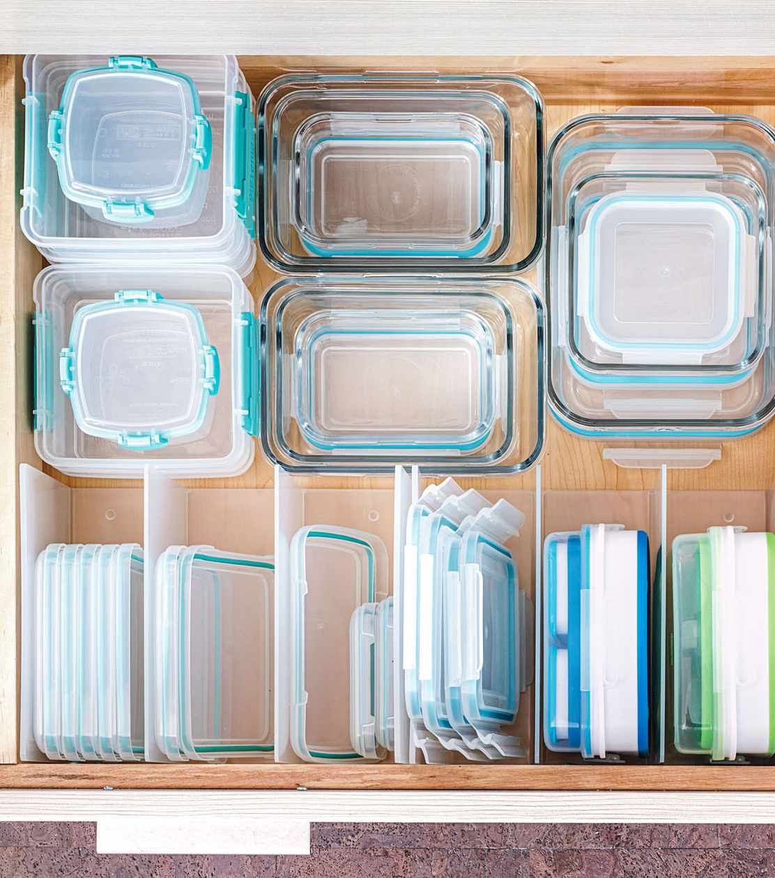 kitchen drawer filled with stackable containers