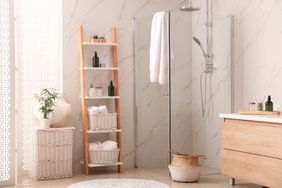 glass shower in modern marble bathroom