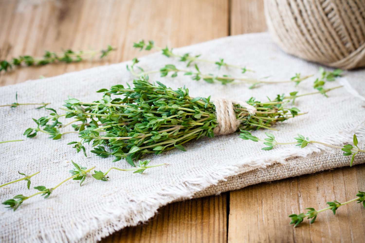 bundle of fresh thyme on sackcloth