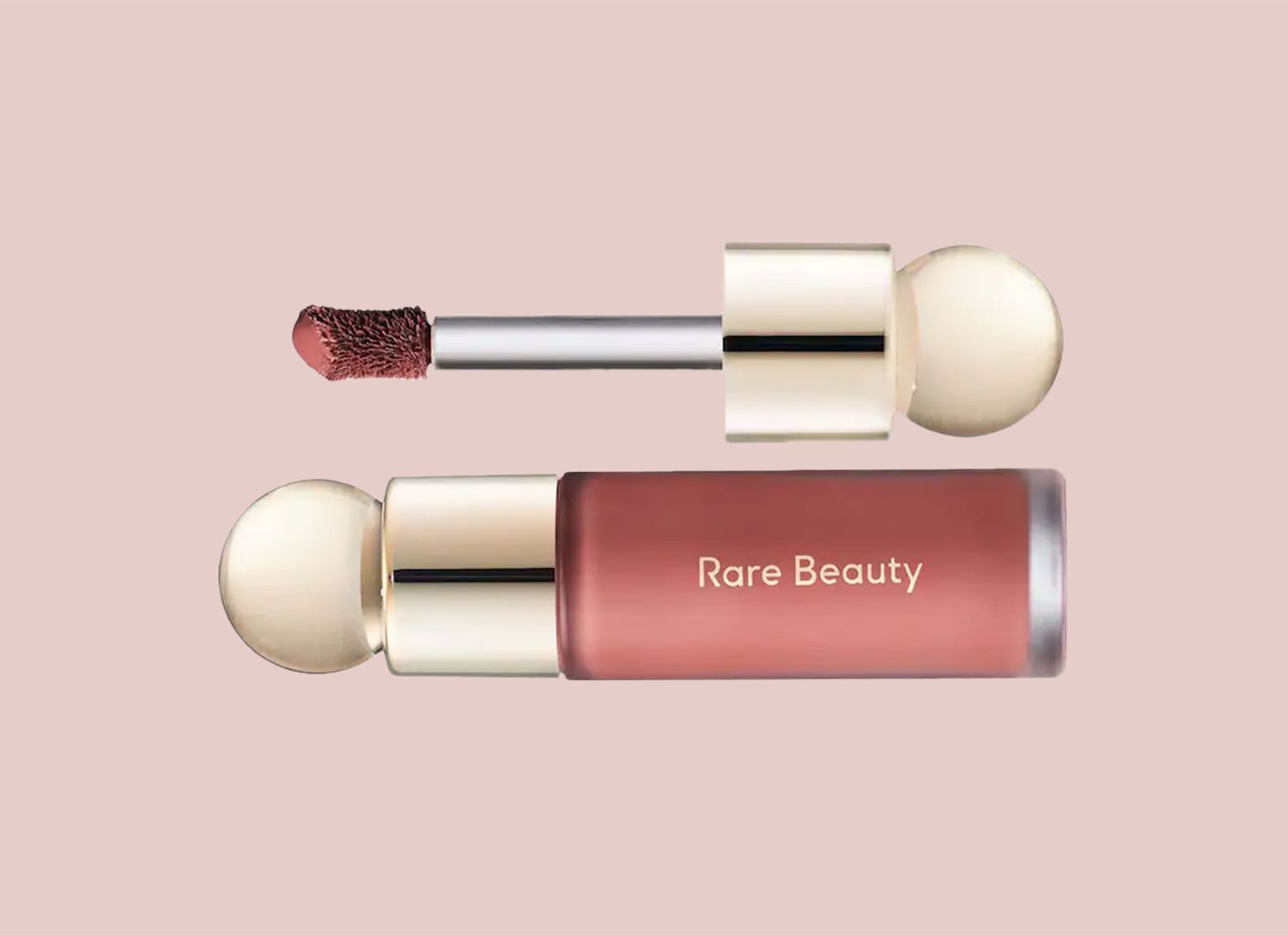 Rare Beauty liquid blush product on a pink background