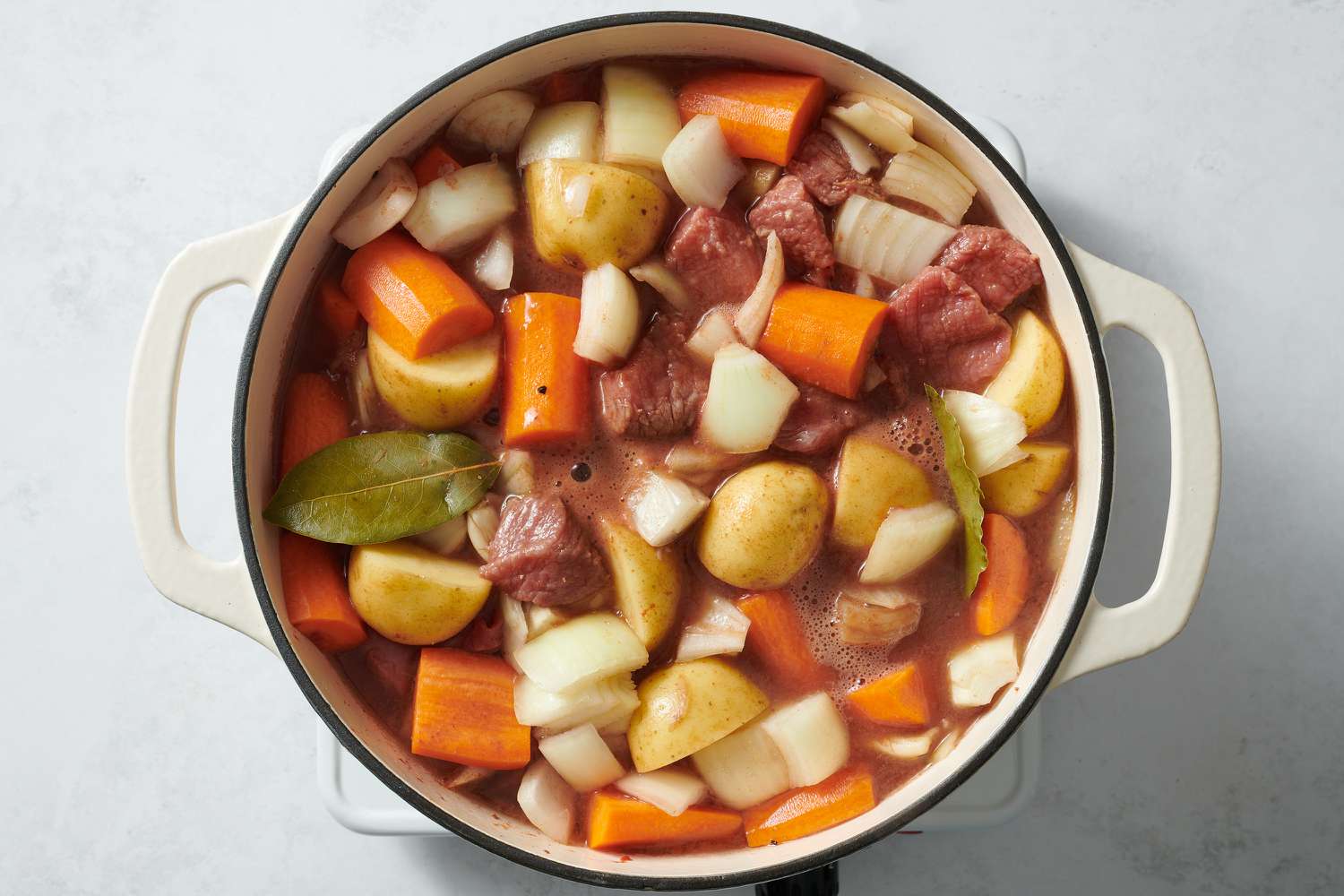 beef stew cooking on burner