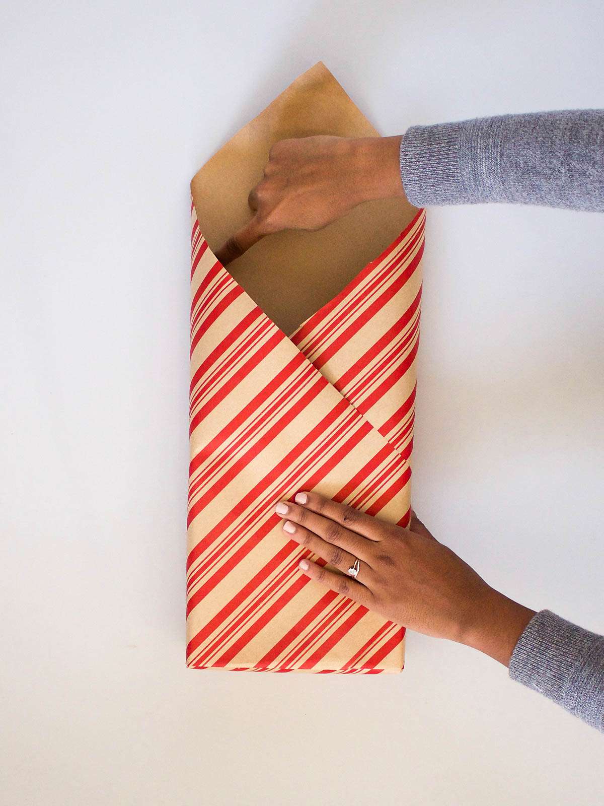 Person wrapping gift