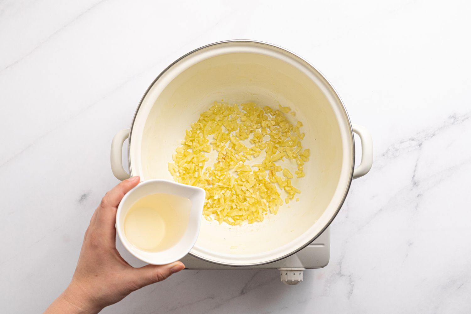 Gnocchi with Tomato Sauce - pouring wine