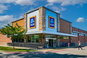 An Aldi grocery store exterior with the logo prominently displayed on the building
