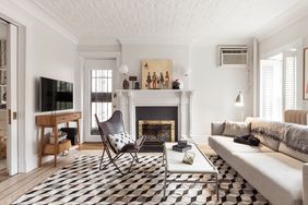 Living room with black and white abstract rug