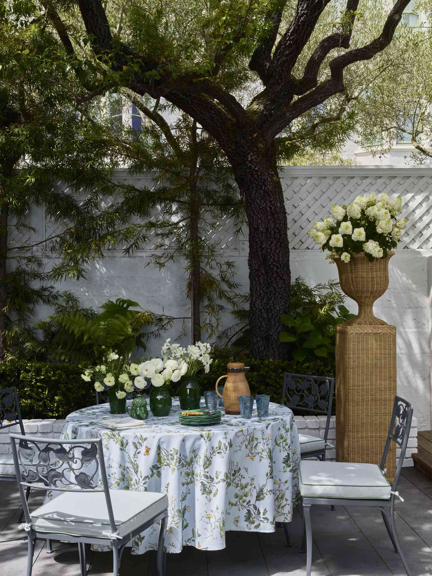 Floral pattern table cover on a patio
