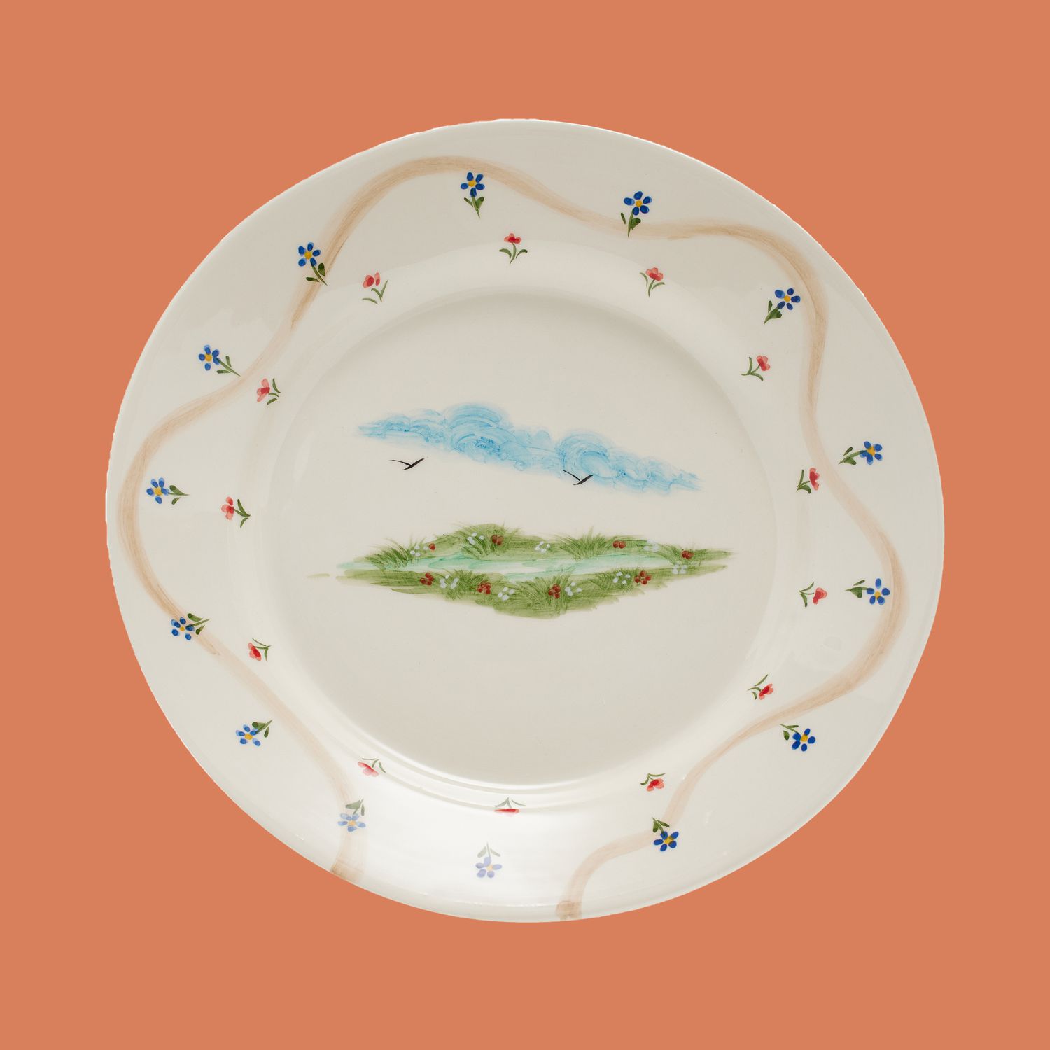 ceramic dinner plate on an orange background